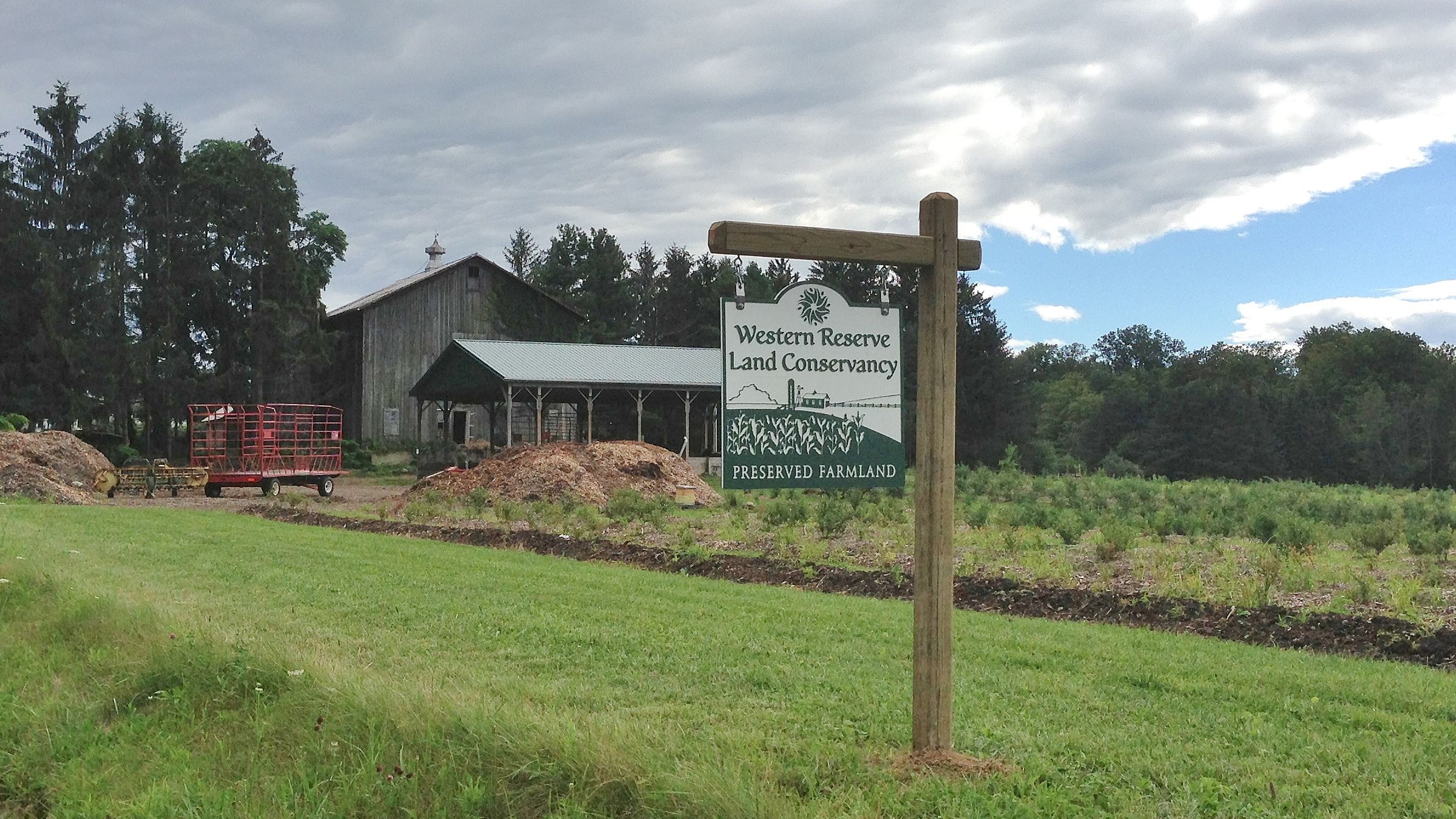 A Western Reserve Land Conservancy sign sits on the Messenger farm.