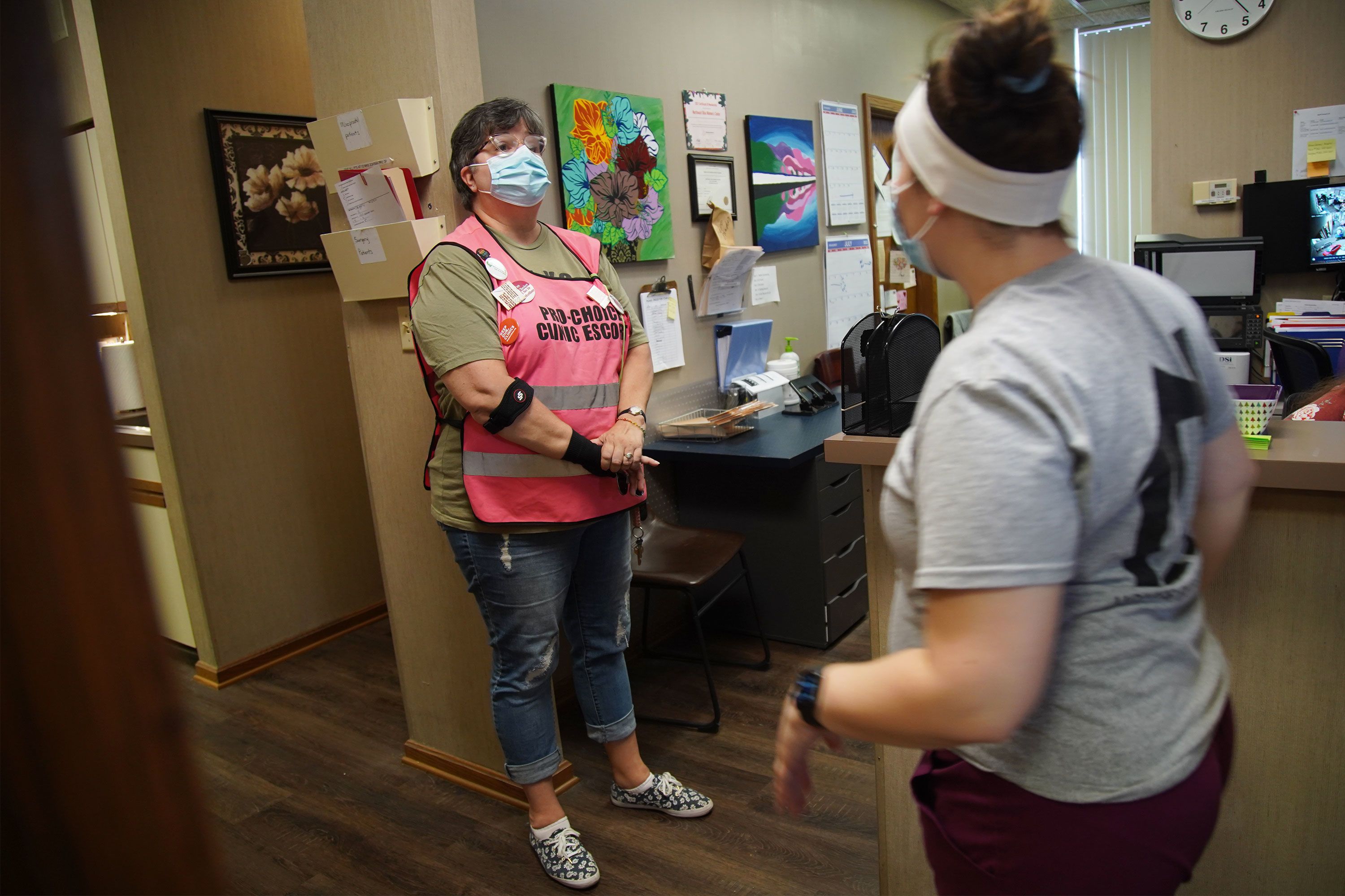 A clinic escort who goes by "Madre" stands inside the Northeast Ohio Women’s Center in Cuyahoga Falls.