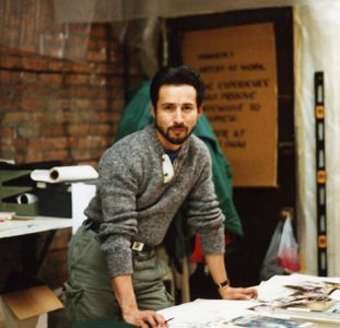 John Rivera-Resto poses by a worktable in his studio, circa late 1990s.