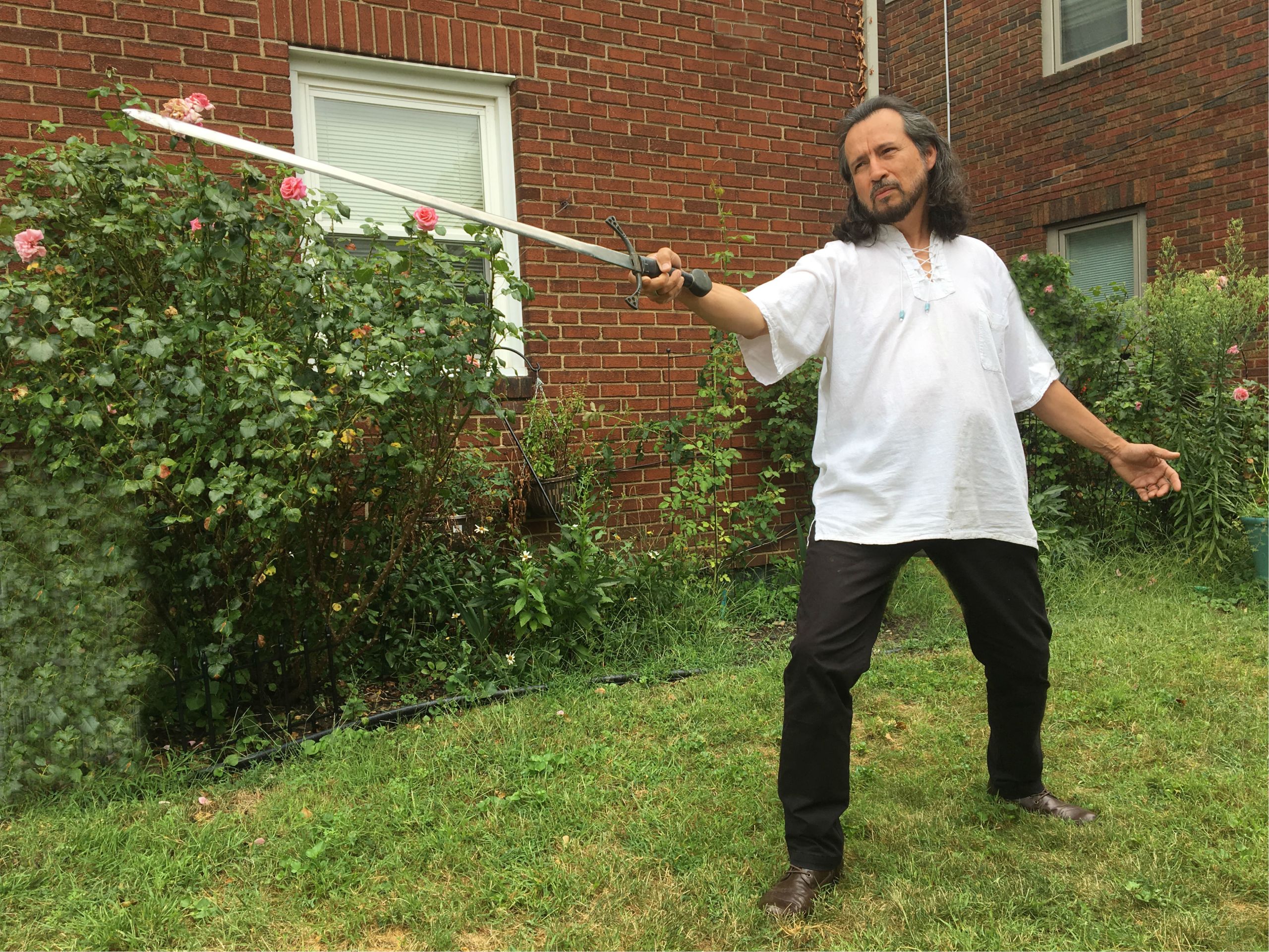 Rivera-Resto strikes an intimidating pose with a real sword as he emulates his childhood hero Errol Flynn.