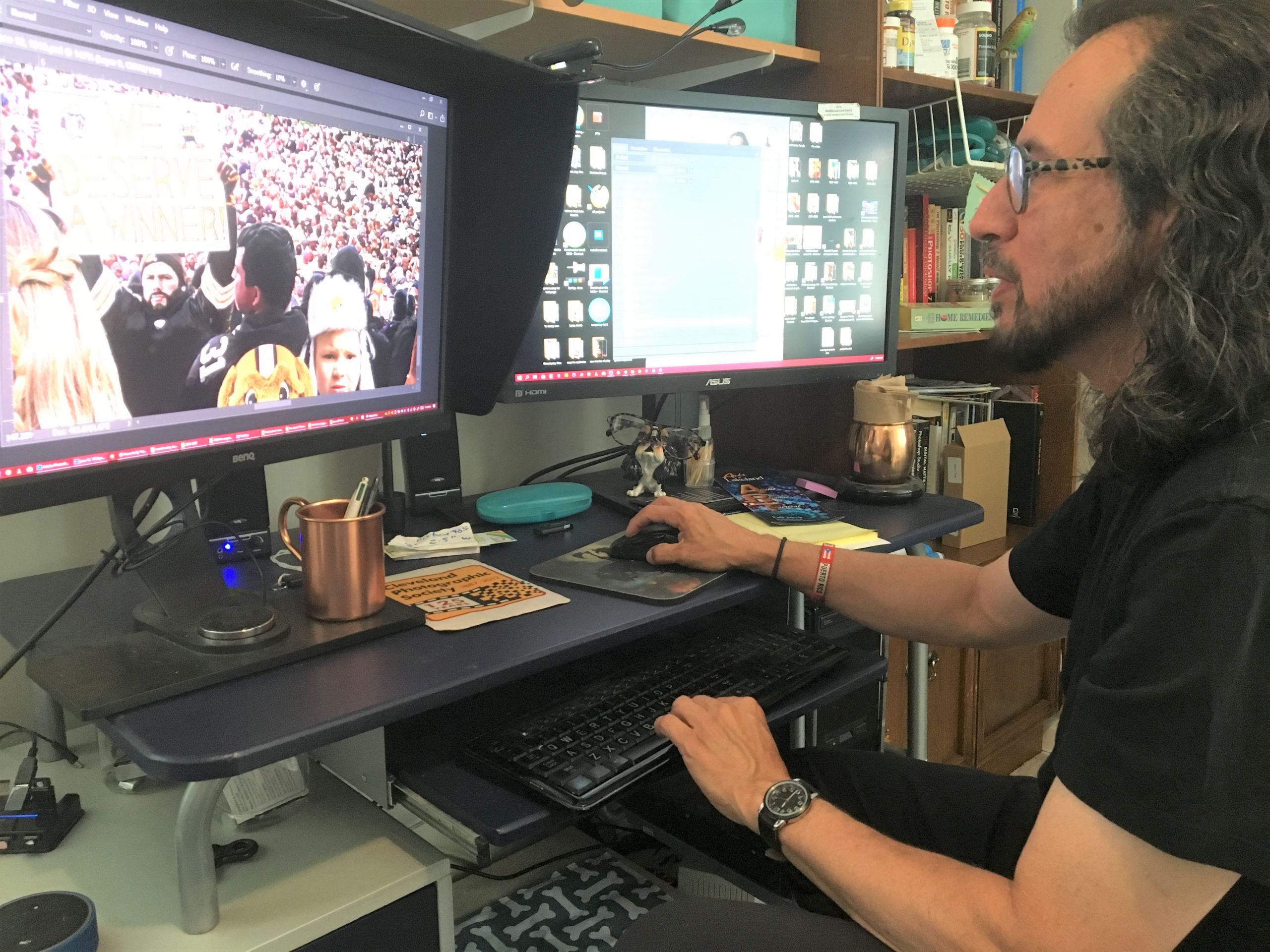 Rivera-Resto uses his home computer to work on a mural of First Energy stadium