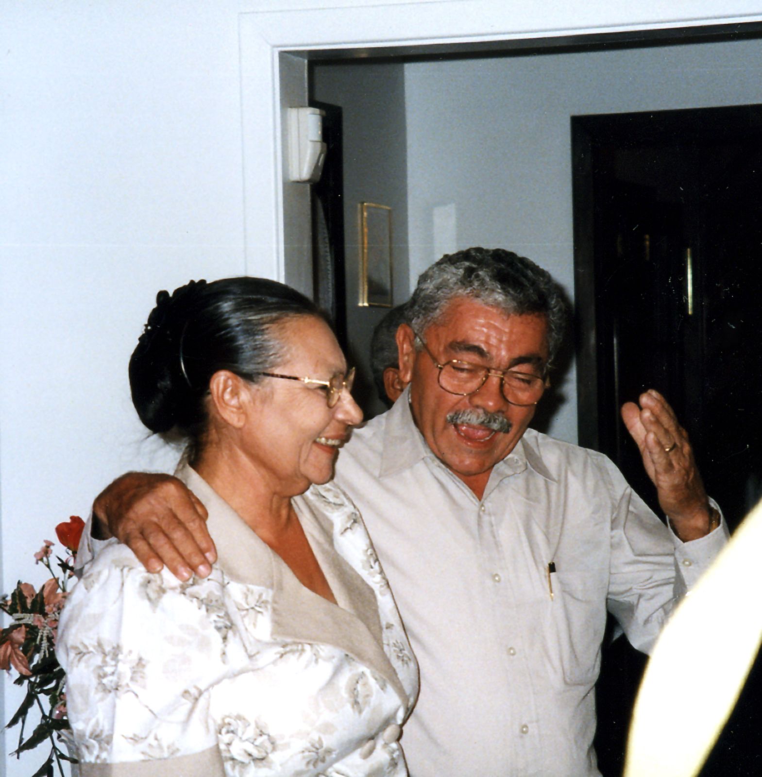 Rivera-Resto's parents share a laugh. His last name combines that of his mother, Jesua Resto-Placeres de Rivera and his dad, John Rivera.