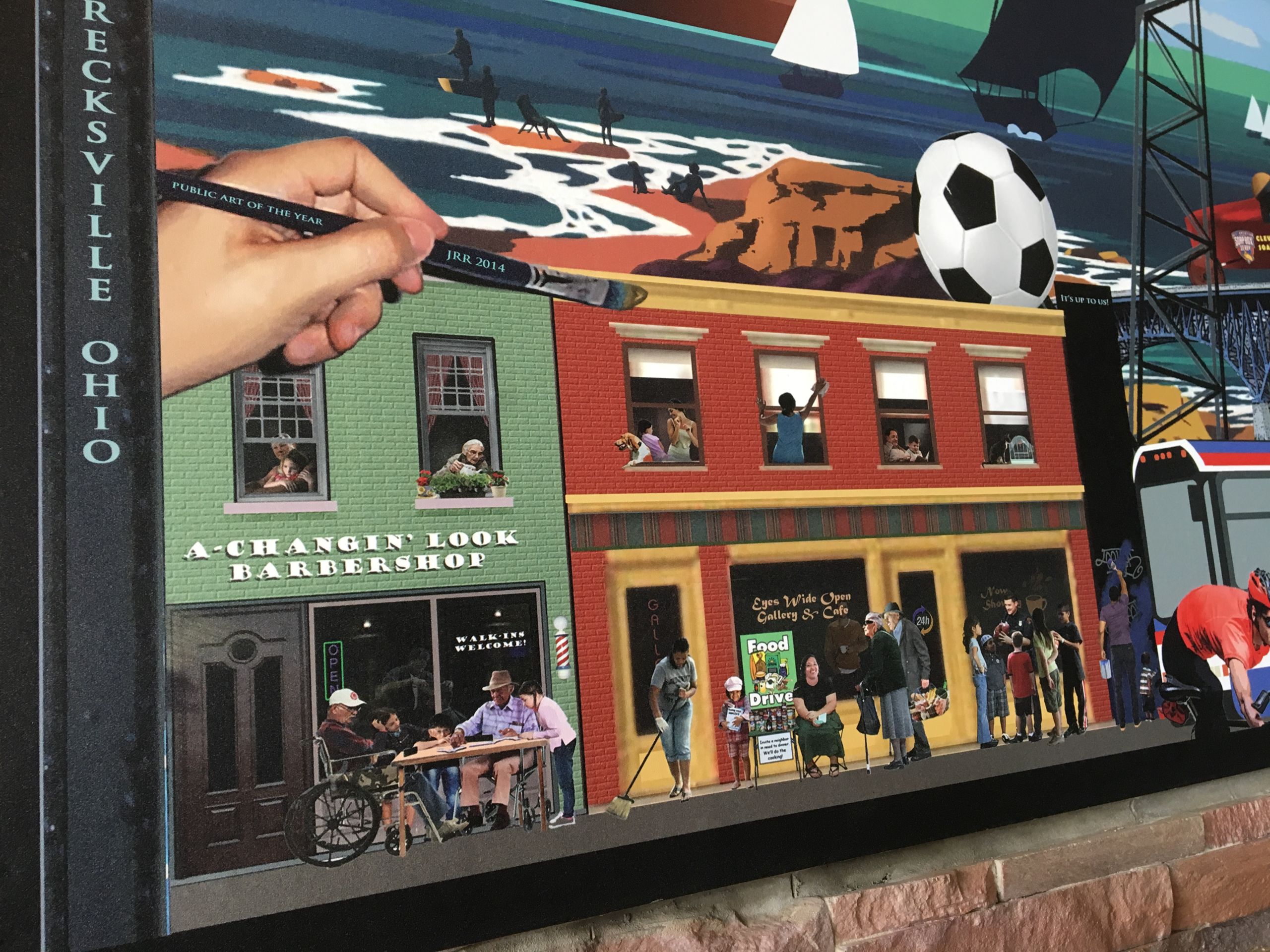 Rivera-Resto slyly included his "It's Up To Us" mural in a larger painting of iconic Cleveland spots on display at Slyman's Deli in Brecksville.